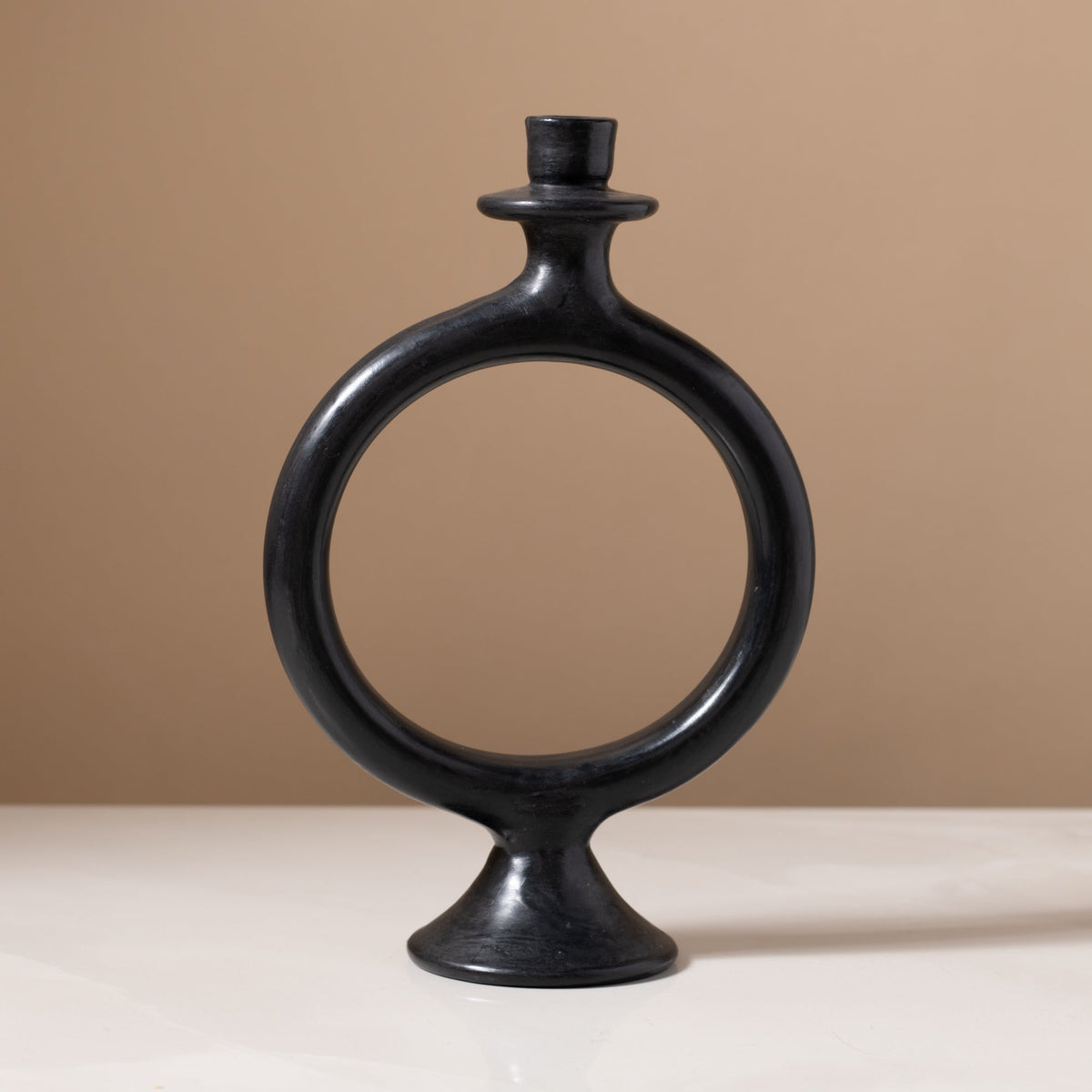 O Candleholder